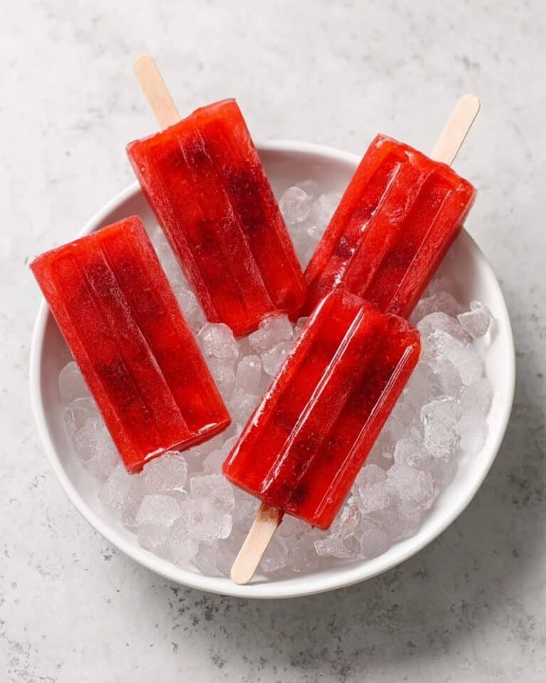 Refreshing Iced Tea Popsicles with Rosehips, Raspberry Leaf Tea, and Fresh Berries Recipe